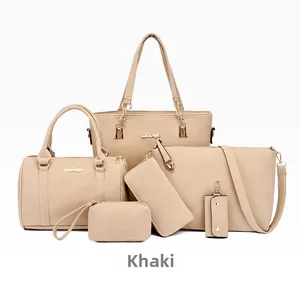 Macro detail of khaki 6-piece handbag set featuring matte faux leather and gold hardware