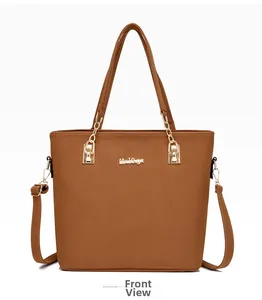 Front view of large brown faux leather tote bag with gold chain and brand logo detail