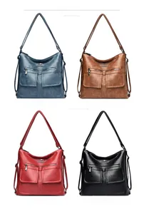 Bolsos de mujer en cuero sintético azul, marrón, rojo y negro con bolsillos frontales