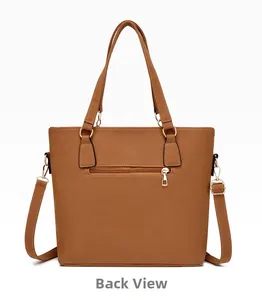 Rear view of a brown tote bag featuring a practical zipper pocket and adjustable strap