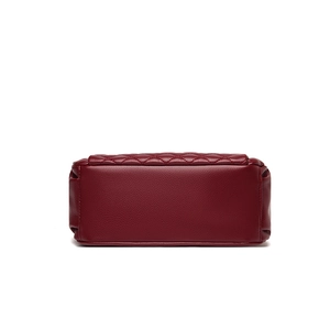 Quilted burgundy faux leather crossbody bag with spacious interior and soft texture