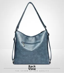 Vista trasera del bolso tote azul Morandi con un práctico bolsillo con cremallera