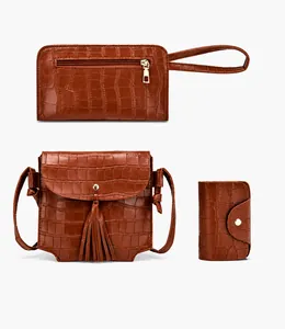 Three-piece brown crocodile texture bag set with tassel tote, zip wallet and snap card holder