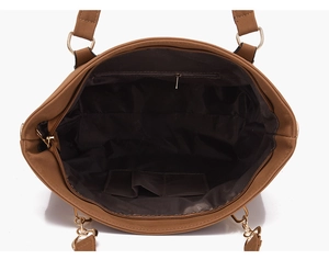 Interior view of tote bag featuring a main compartment with zipper pocket and dual side slots