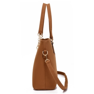 Brown matte leather tote bag with gold chain accents and side view silhouette