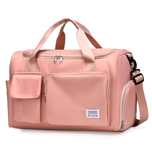 Pink waterproof nylon travel bag with shoulder strap for fitness and short trips