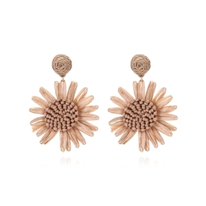 Boucles d'oreilles tournesol en raphia fait main avec texture tissée style bohème