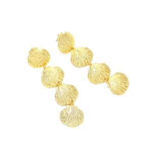 Gold multi-layer shell drop earrings with textured metallic finish and tiered design