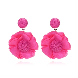 Exaggerated rose pink chiffon flower earrings with handcrafted raffia woven studs
