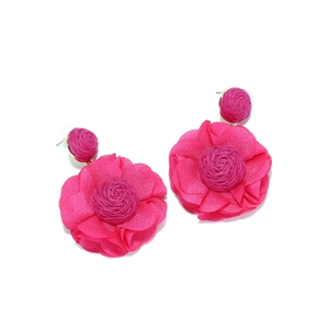 Detailed view of handmade fuchsia chiffon flower earrings with textured petals