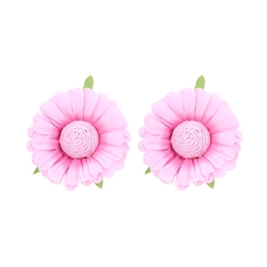 Set of two handmade pink fabric flower earrings with green leaf detail on white background
