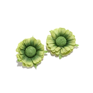 Detailed top view of handmade fabric green flower earrings with layered petals and texture