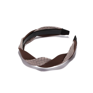 Serre-tête large à motif pied-de-poule et design torsadé pour un style élégant