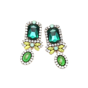 Vintage luxury palace style gold earrings with emerald green crystals and rhinestones