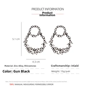Detail of gunmetal alloy hoop earrings with sparkling rhinestones and exact dimensions