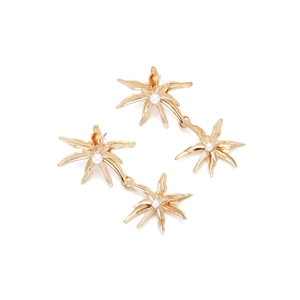 Golden flower earrings with pearl centers in a vintage minimalist layered metal design