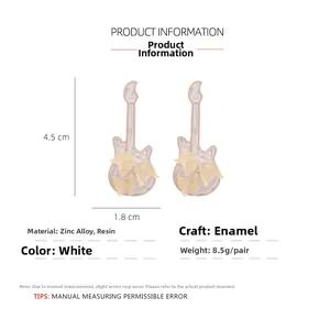 Detail showing white guitar earrings with butterfly design and size dimensions 4.5x1.8cm