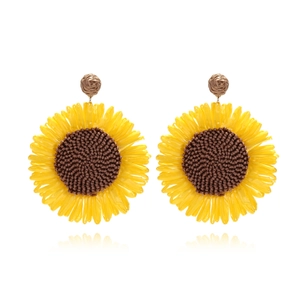 Handmade woven raffia sunflower drop earrings in yellow and brown for women's vacation style