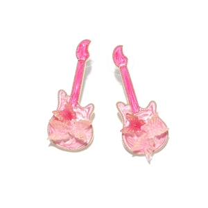 Detailed view of pink guitar earrings with enamel butterfly accents and gold bead edges