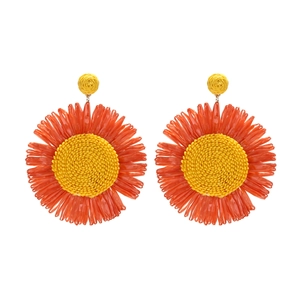 Handwoven raffia sunflower statement earrings in bright orange and yellow tropical style