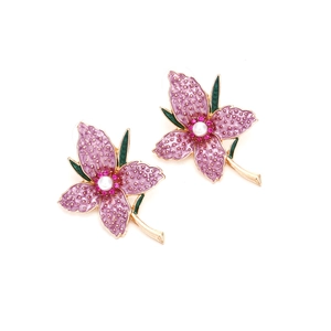 Pink enamel orchid flower earrings with faux pearl and crystal accents on gold alloy