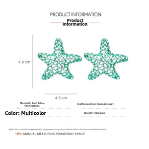 Macro view of turquoise starfish earrings with dimensions and rhinestone details
