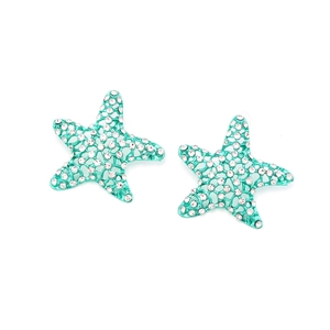 Detail of teal hollow starfish earrings featuring crystal rhinestones and silicone backs