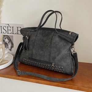 Retro grey leather tote bag with rivet studs, tassels and adjustable shoulder strap