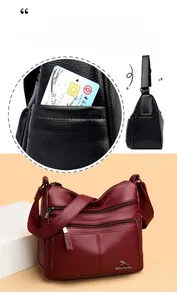 Detailed view of women's soft leather crossbody bag with multiple pockets and side slot
