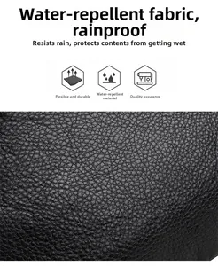 Close-up of water-resistant pebbled leather texture on black oversized tote bag