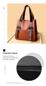 Close-up of the premium leather texture and precise stitching on a brown tote handbag