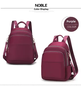 Vue avant et latérale du sac à dos en nylon violet résistant à l'eau avec fermetures