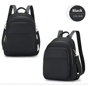 Vue détaillée du sac à dos noir en tissu Oxford imperméable avec fermetures et poches