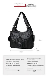 Detailed view of vintage washed leather tote bag showing 32cm dimensions and black texture