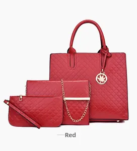 Three-piece red quilted tote set with gold leaf pendant and chain crossbody bag
