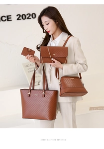 Dettaglio del set borse in pelle marrone da quattro pezzi con tote, tracolla e pochette