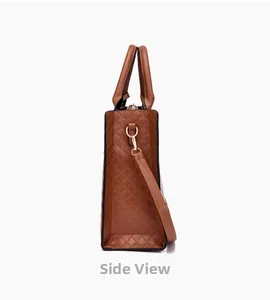 Detailed side view of caramel quilted tote bag with gold hardware and shoulder strap