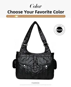 Detail of black soft PU leather shoulder bag with multi-pocket design and metal rivets