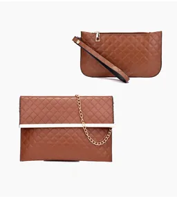 Detail of a brown quilted handbag set including a chain flap bag and a zipper pouch