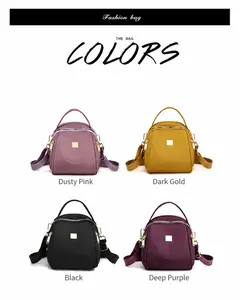 Borse in tessuto Oxford mostrate nei colori rosa scuro, oro, nero e viola