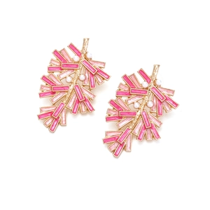Pink leaf branch earrings with gold finish and small pearls on a clean white background