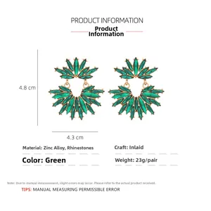 Detailed size chart of green crystal flower earrings featuring gold alloy and rhinestones
