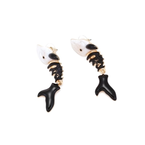Detailed view of creative fishbone earrings in black and white marble resin with gold hooks