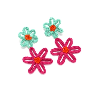 Handmade crochet flower earrings in mint green and magenta with beaded orange centers