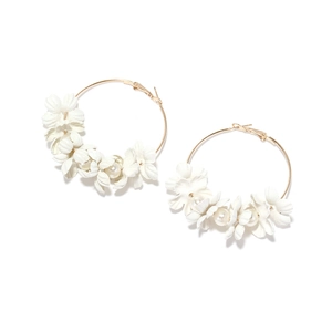 Elegant gold hoop earrings with white fabric floral petals and faux pearl centers