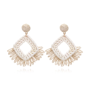 Bohemian raffia tassel drop earrings with geometric weave and ivory fringe