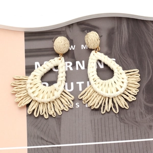 Bohemian handmade raffia fan fringe drop earrings in cream white with woven waterdrop shape