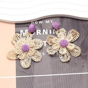 Handmade bohemian raffia flower earrings in purple and beige, vacation style floral studs