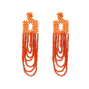 Handmade orange beaded tassel earrings featuring a flower motif and layered U-shaped fringe
