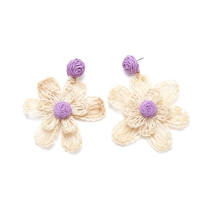 Handmade bohemian woven raffia flower earrings in beige and purple petal design